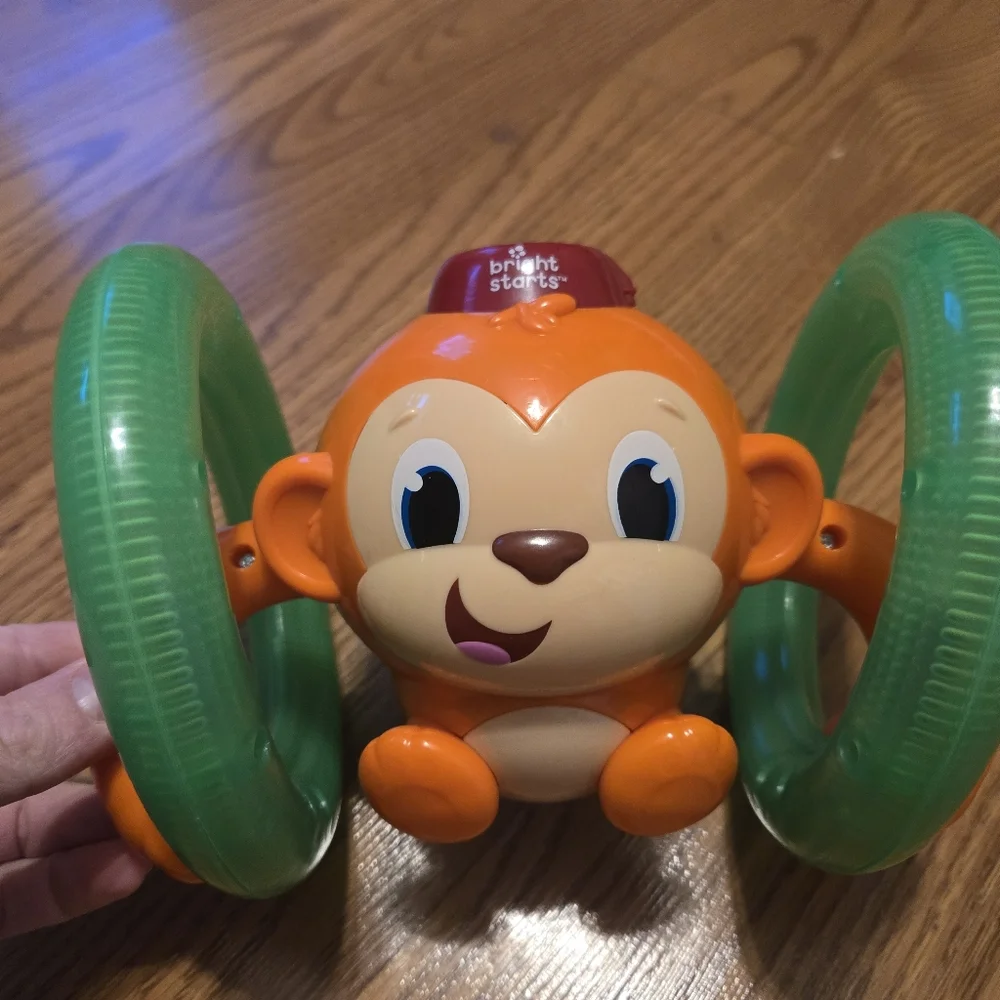 Bright Starts Roll & Glow Monkey  Colorful Rolls Sings Baby Infant Crawling Toy